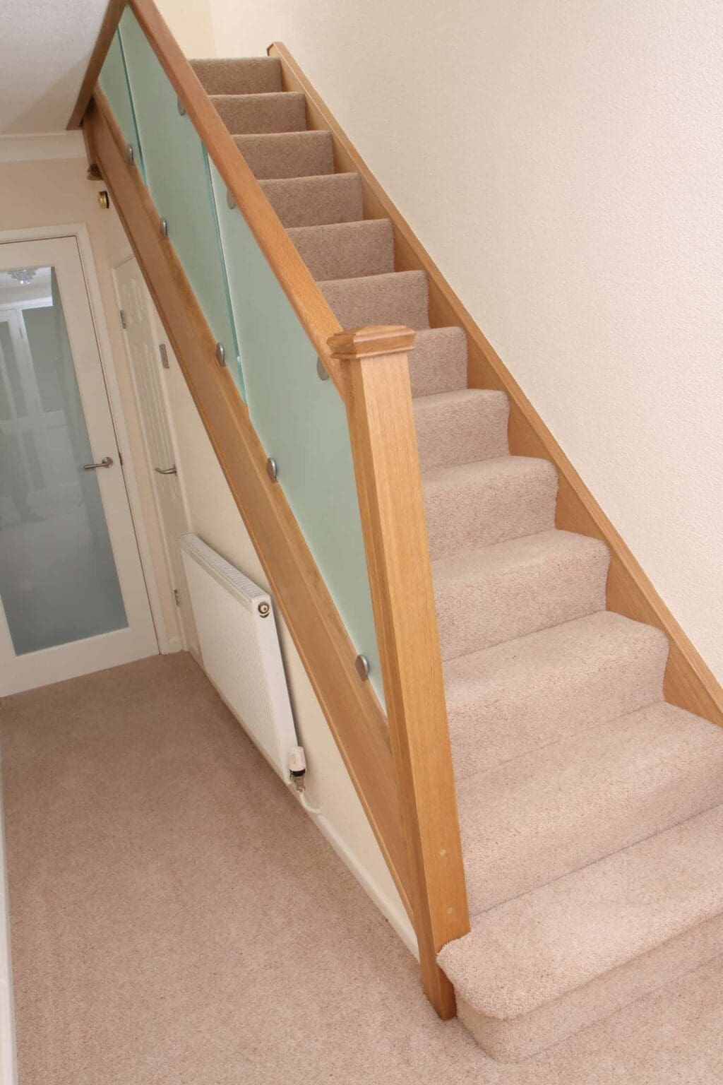 Sandblasted glass and oak staircase
