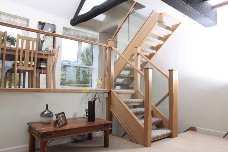 split level dining room with oak & glass