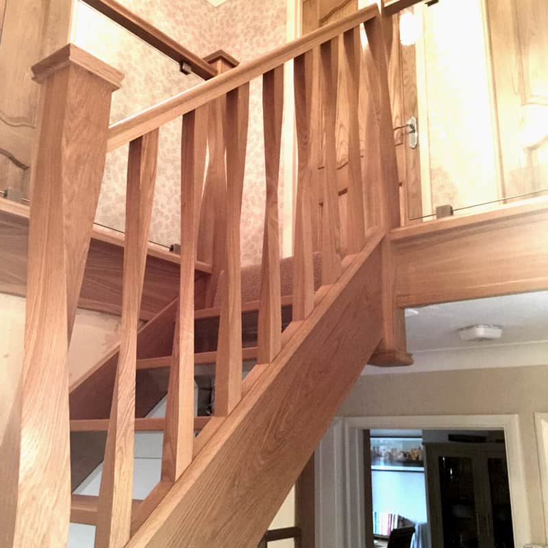 Open-tread with twisted newel