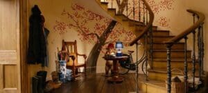 paddington-bear-in-the-foyer-with-spiral-staircase-and-mural