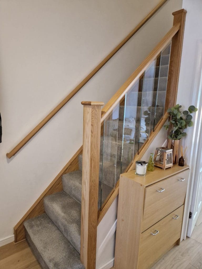 Oak staircase renovation with glass spindles in South London