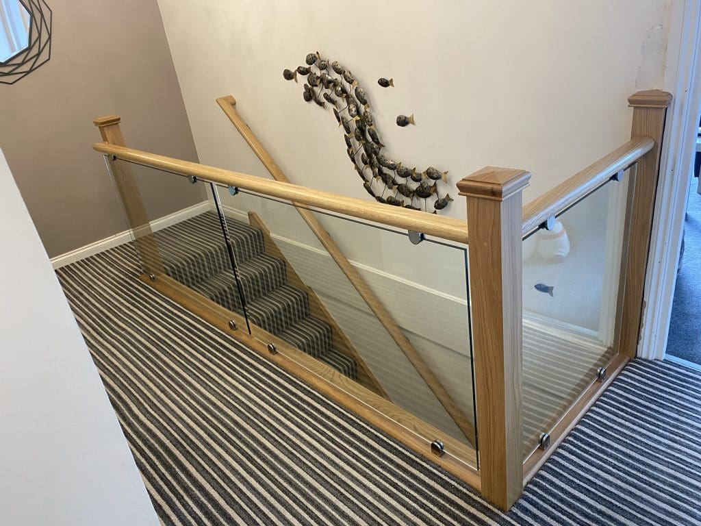 Glass & oak staircase renovation in Brighton