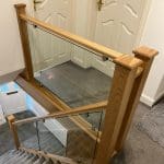 prefinished oak and clamped glass staircase renovation in Stockport