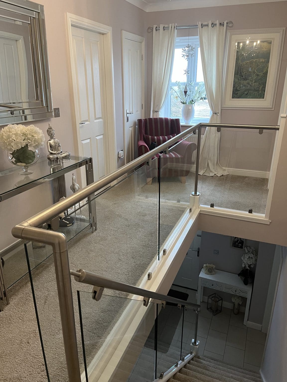 Abbott-Wade staircase renovation with stainless steel & glass in Hinckley