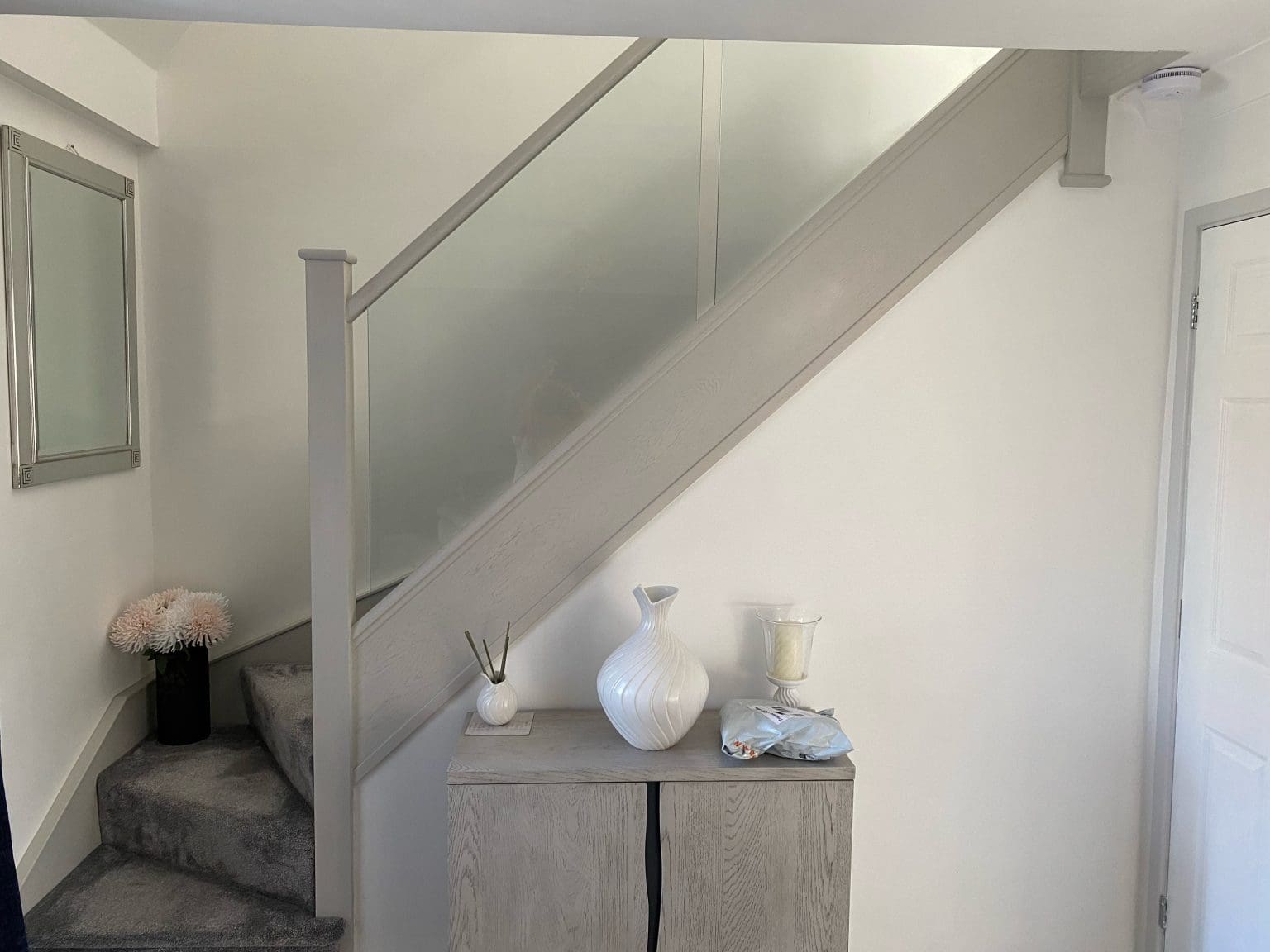 a stained oak and glass staircase renovation in Ipswich