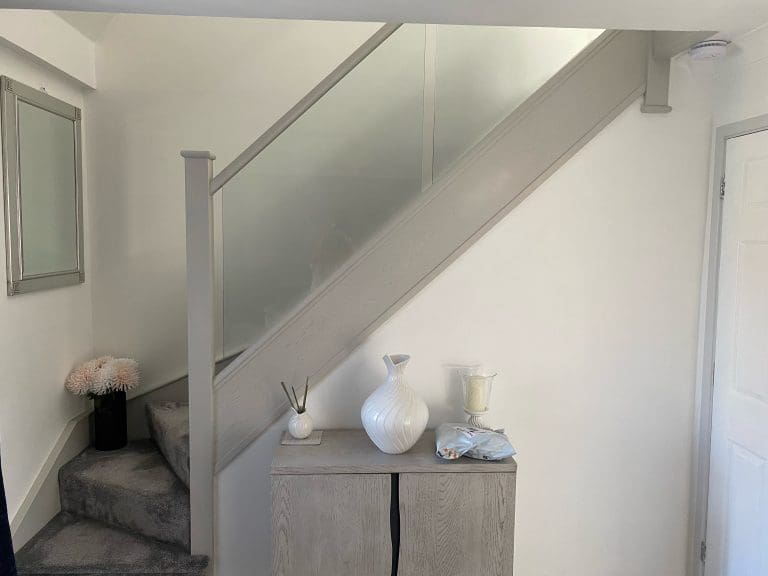 a stained oak and glass staircase renovation in Ipswich