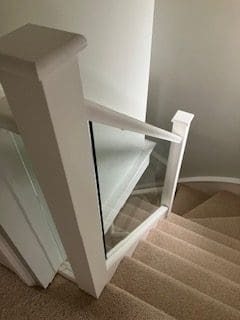 White staircase renovation in Telford with embedded glass panels