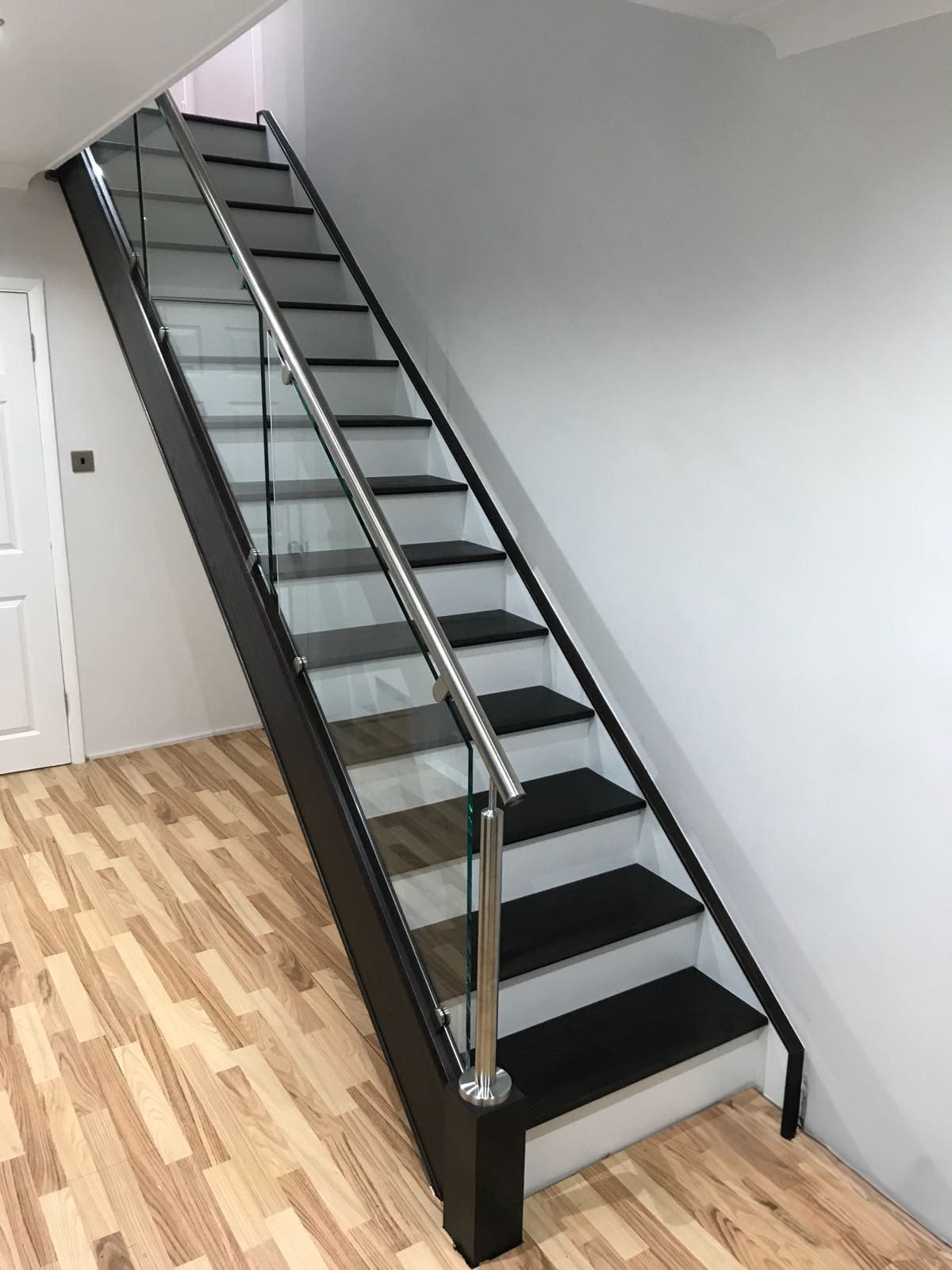 A steel & glass staircase renovation in Crawley