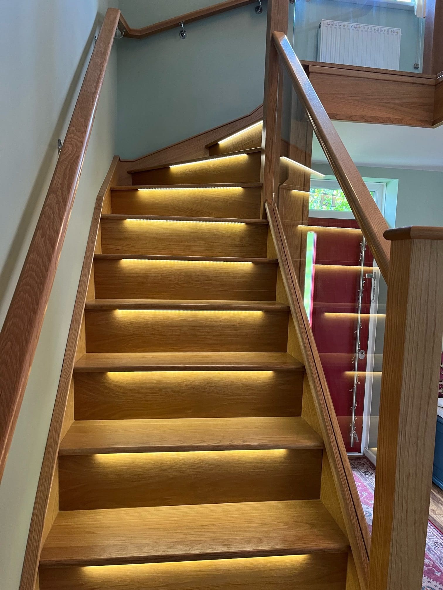 an embedded glass and oak staircase renovation in corby, northamptonshire