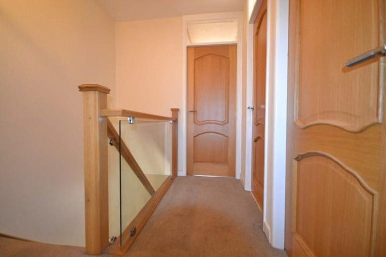 an oak & glass staircase renovation in Leigh