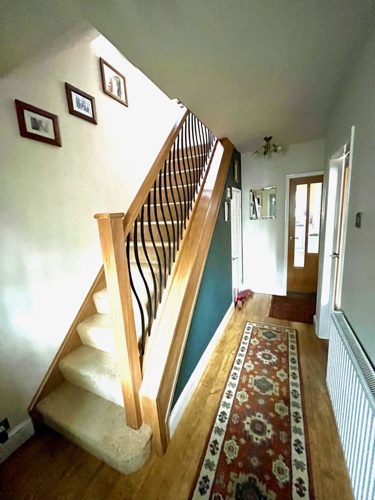 an oak staircase renovation in Kidderminster, Worcestershire with our wave metal spindles