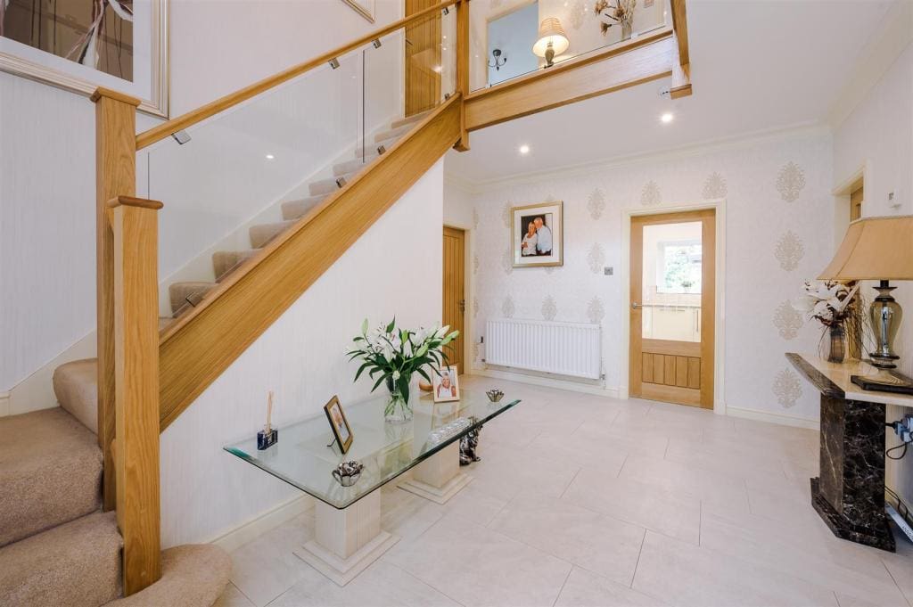 An oak & clamped glass staircase renovation in Bury