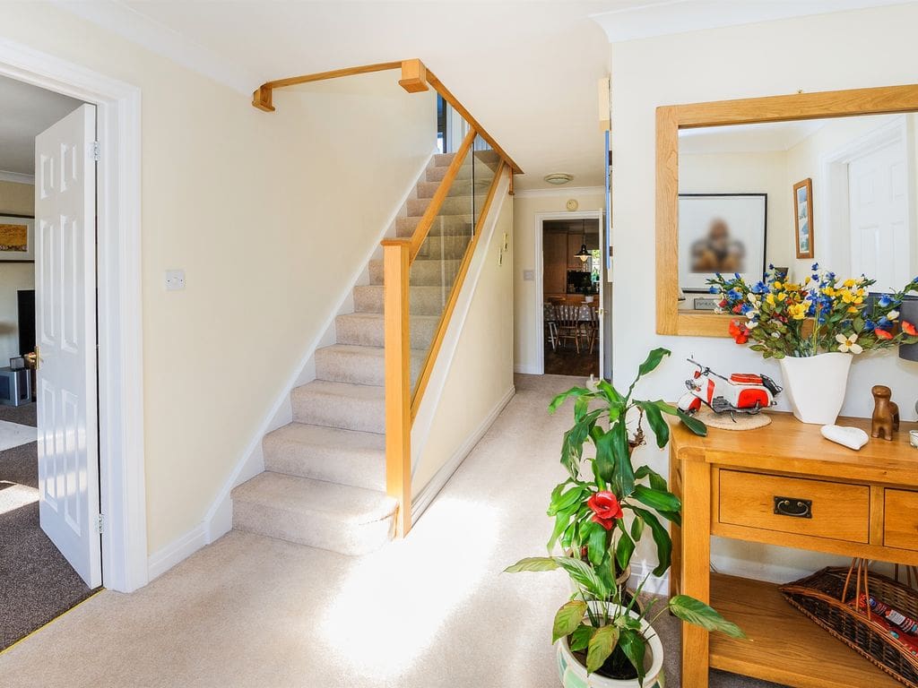 This Ross on Wye entrance hall is filled with light thanks to this oak & glass Herefordshire staircase renovation.