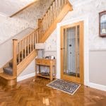 A timeless oak staircase renovation in St Helens with stop chamfered oak newel posts & spindles.
