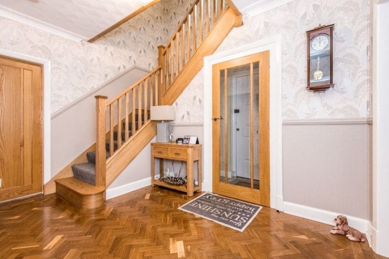A timeless oak staircase renovation in St Helens with stop chamfered oak newel posts & spindles.