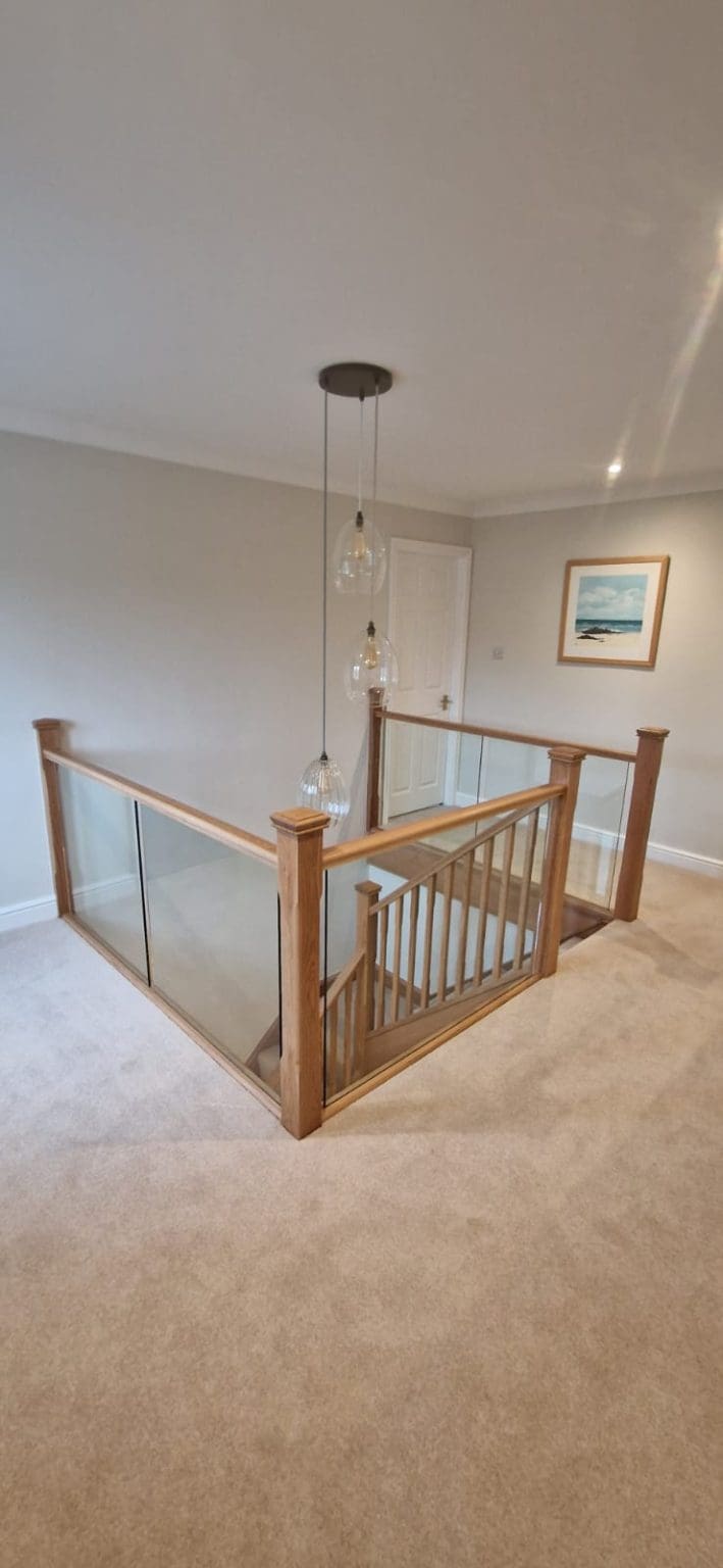 This clever combination of oak spindles paired with glass in West Riding demonstrates the bespoke nature & versatility of every installation.