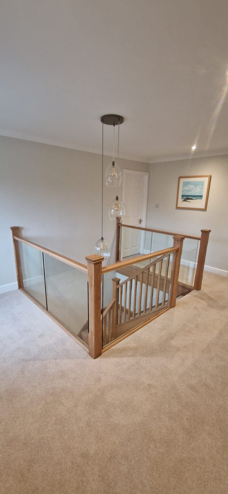 This clever combination of oak spindles paired with glass in West Riding demonstrates the bespoke nature & versatility of every installation.