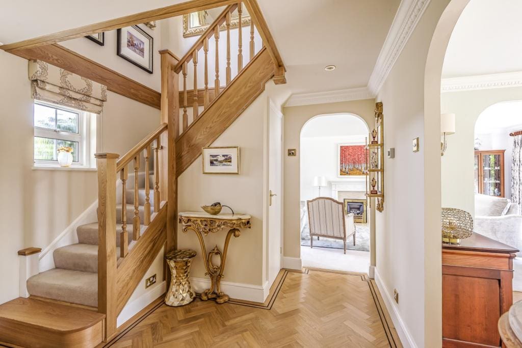 A perfectly balanced traditional staircase in-keeping with the classic tones of the beautiful Elmbridge property.