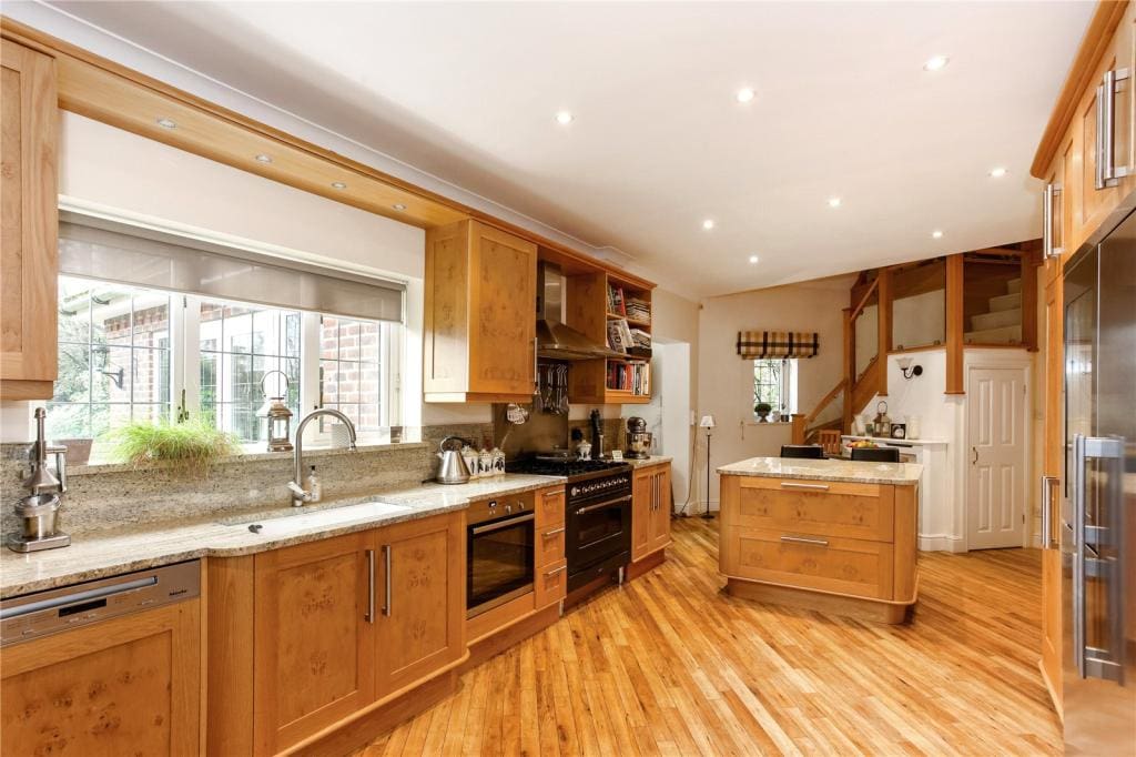 2 different staircases are transformed in this Farnham family home. A grand central staircase to Wow visitors and a second staircase for convenient access. Two staircases, two different stylings, two excellent outcomes.