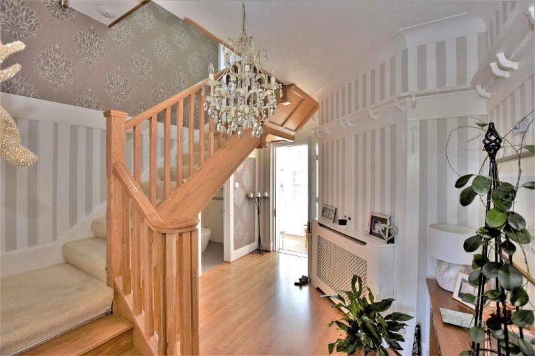 Fluted top chamfered newel posts & spindles with a stylish volute adds the extra flourish for this dream property in Lytham St Annes.