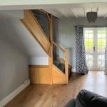 An oak & glass Welsh staircase renovation invigorates this North Wales living space.