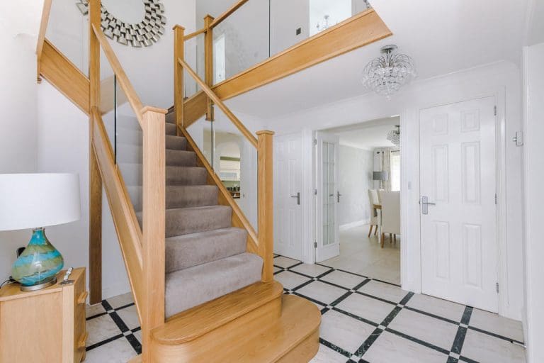 oak and glass central staircase renovation in St Helens, Merseyside