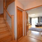 This oak & glass staircase renovation in Bracknell fits perfectly into its surroundings matching with other fixtures & fittings.