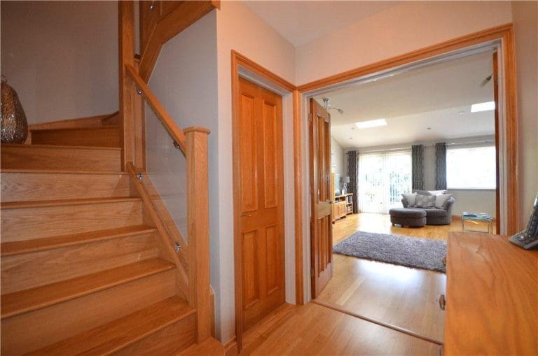This oak & glass staircase renovation in Bracknell fits perfectly into its surroundings matching with other fixtures & fittings.