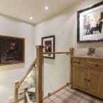 A homely hallway now has a perfectly in-keeping homely staircase with oak & clamped glass.
