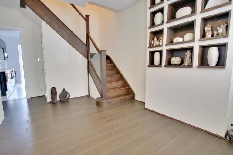 A stained oak staircase renovation in Totton on England's south coast creates cohesion with the existing features of this beautiful home.