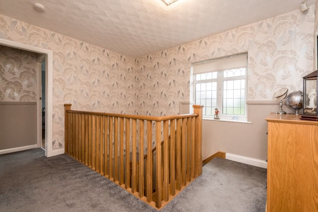 A timeless oak staircase renovation in St Helens, merseyside with stop chamfered oak newel posts & spindles.