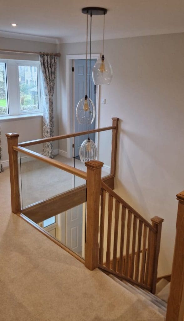 This clever combination of oak spindles paired with glass in West Riding demonstrates the bespoke nature & versatility of every installation.