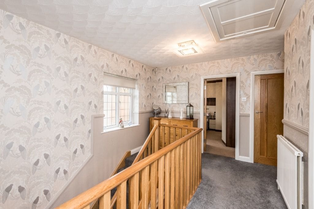 A timeless oak staircase renovation in St Helens, merseyside with stop chamfered oak newel posts & spindles.