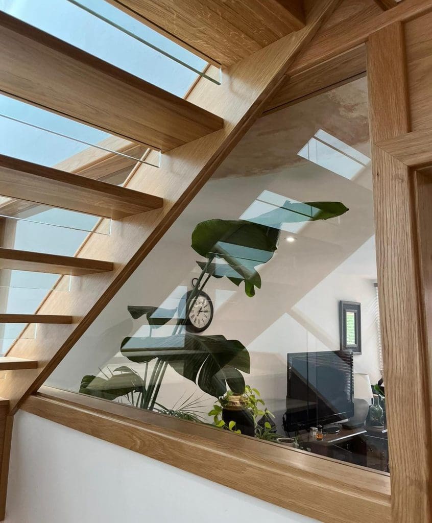 A striking open tread oak staircase in Cheadle Hulme which looks magnificent from every vantage point.