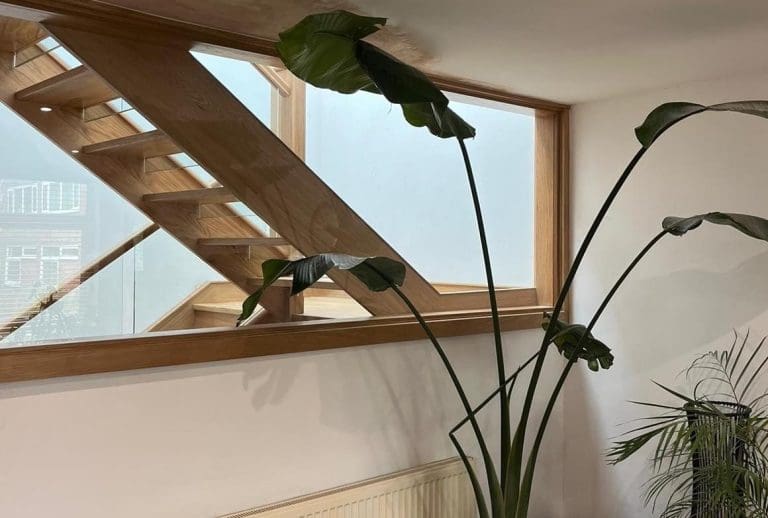 A striking open tread oak staircase in Cheadle Hulme which looks magnificent from every vantage point.