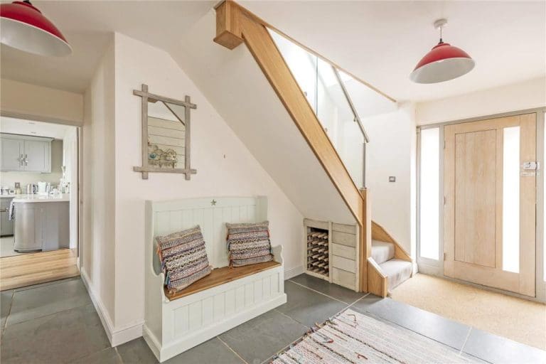 This balustrade in Thetford is the perfect marriage of stainless steel & glass and softened with the warming tones of natural oak.