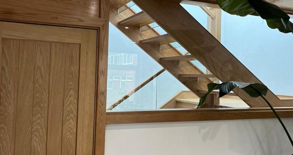 A striking open tread oak staircase in Cheadle Hulme which looks magnificent from every vantage point.