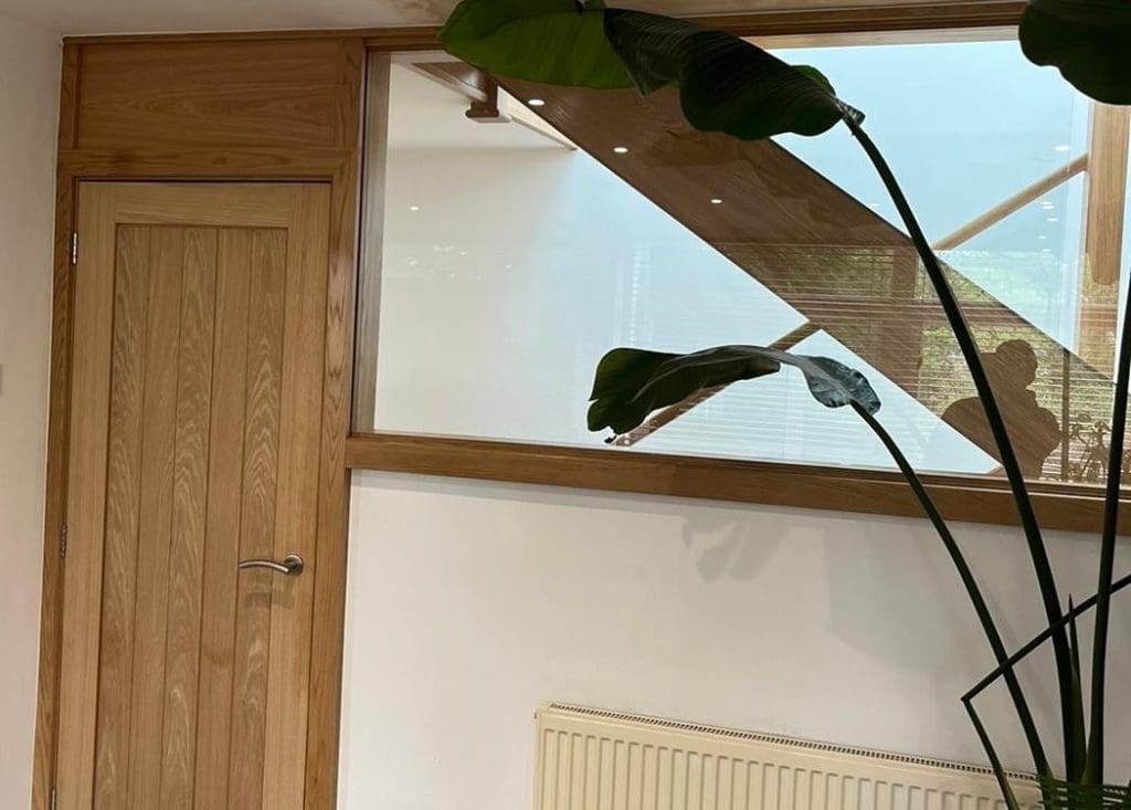 A striking open tread oak staircase in Cheadle Hulme which looks magnificent from every vantage point.
