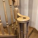A traditional turned oak staircase renovation with stylish volute in Buckley.
