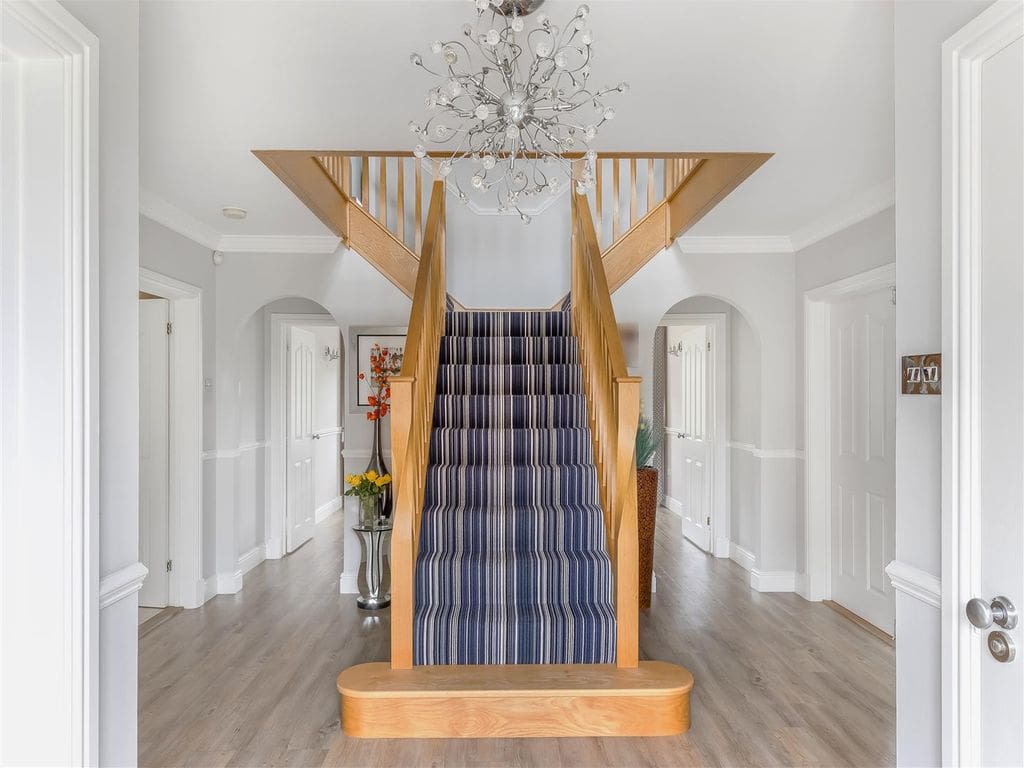 An Enfield home with grand entrance, a big statement and a beautiful staircase which makes it all possible.