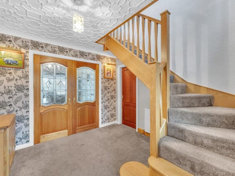 An elegant oak staircase renovation in Leigh with beautiful twisted oak spindles transforms this Lancashire home