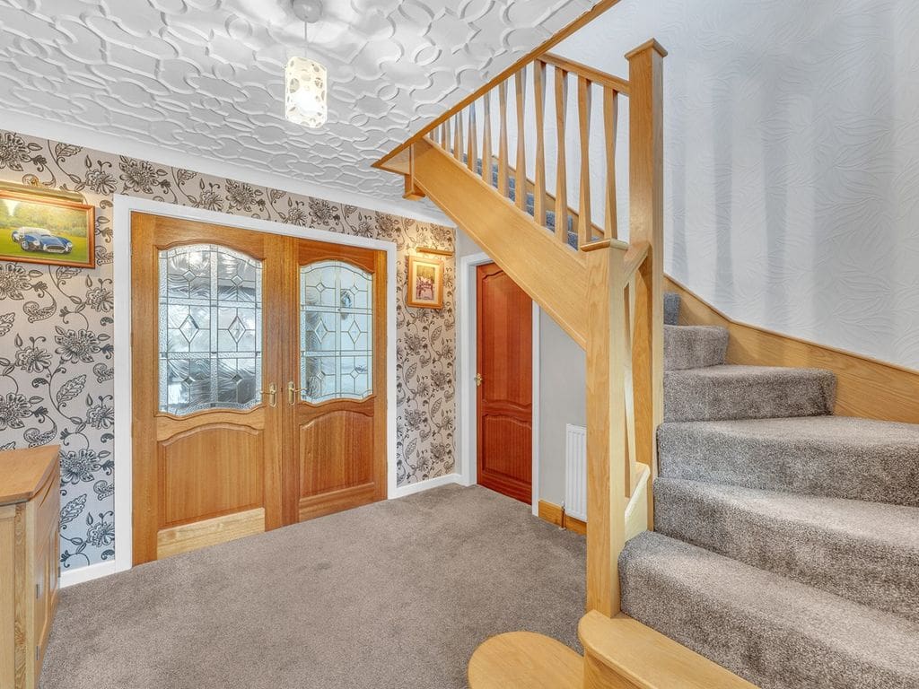 An elegant oak staircase renovation in Leigh with beautiful twisted oak spindles transforms this Lancashire home