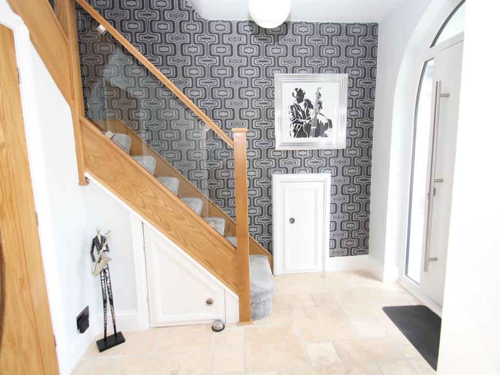 A marvellous Mancunian staircase renovation transforms this home in Urmston using a modern combination of glass & natural prefinished oak