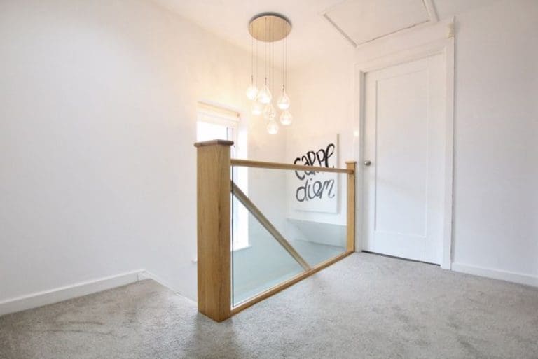 An embedded glass & oak staircase refurbishment in Calderstones brightens this Merseyside home. Wall art, white,